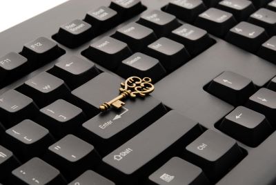 A door key placed on a keyboard